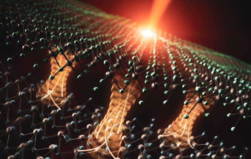 Artistic depiction of electron transfer driven by an ultrashort laser pulse, across an interface between two atomically-thin materials.